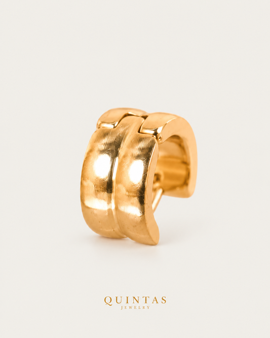 Selena gold double hoop earring standing view on neutral greige, based on actual product photo