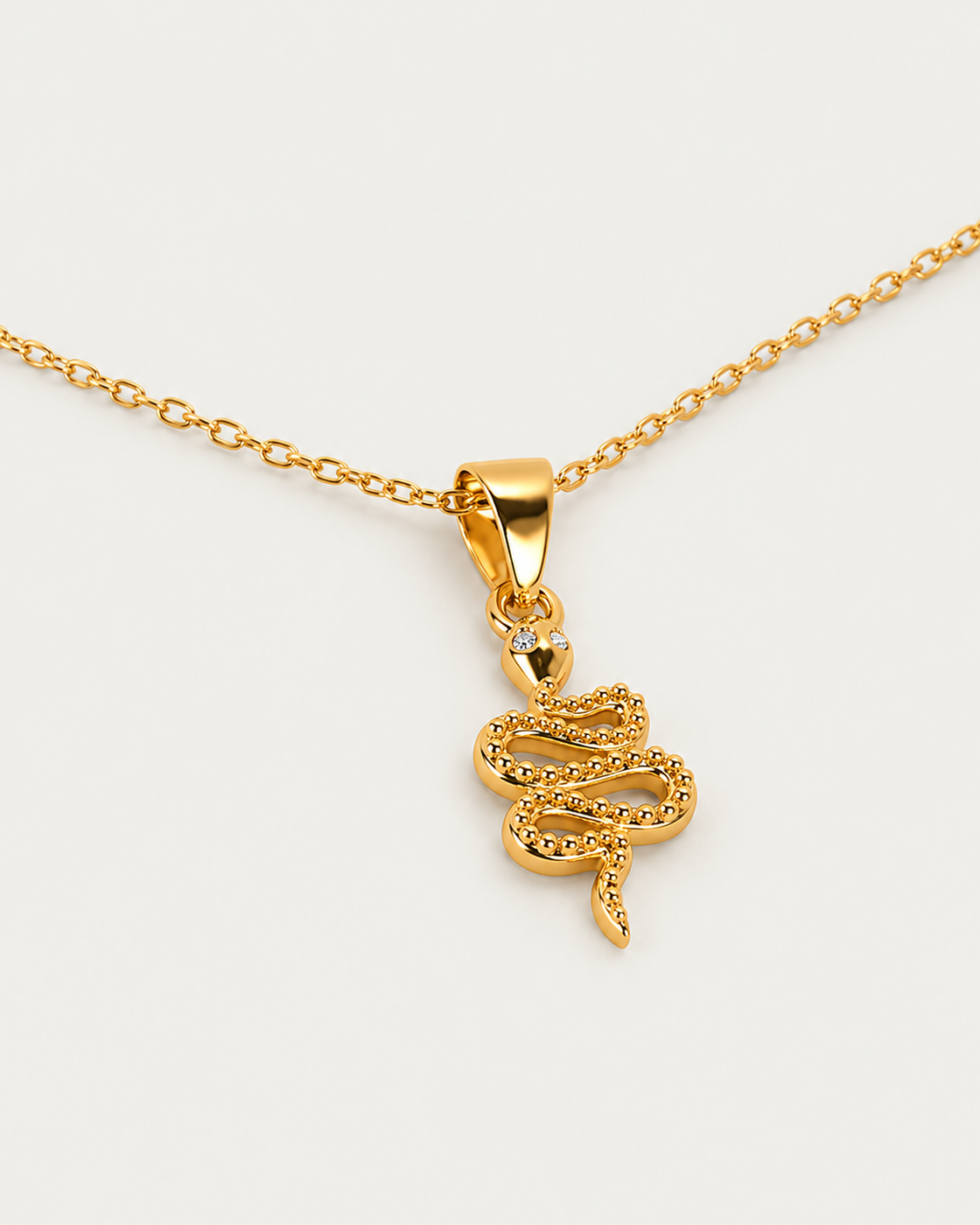 Snake necklace — actual cable-chain oblique view, neutral greige