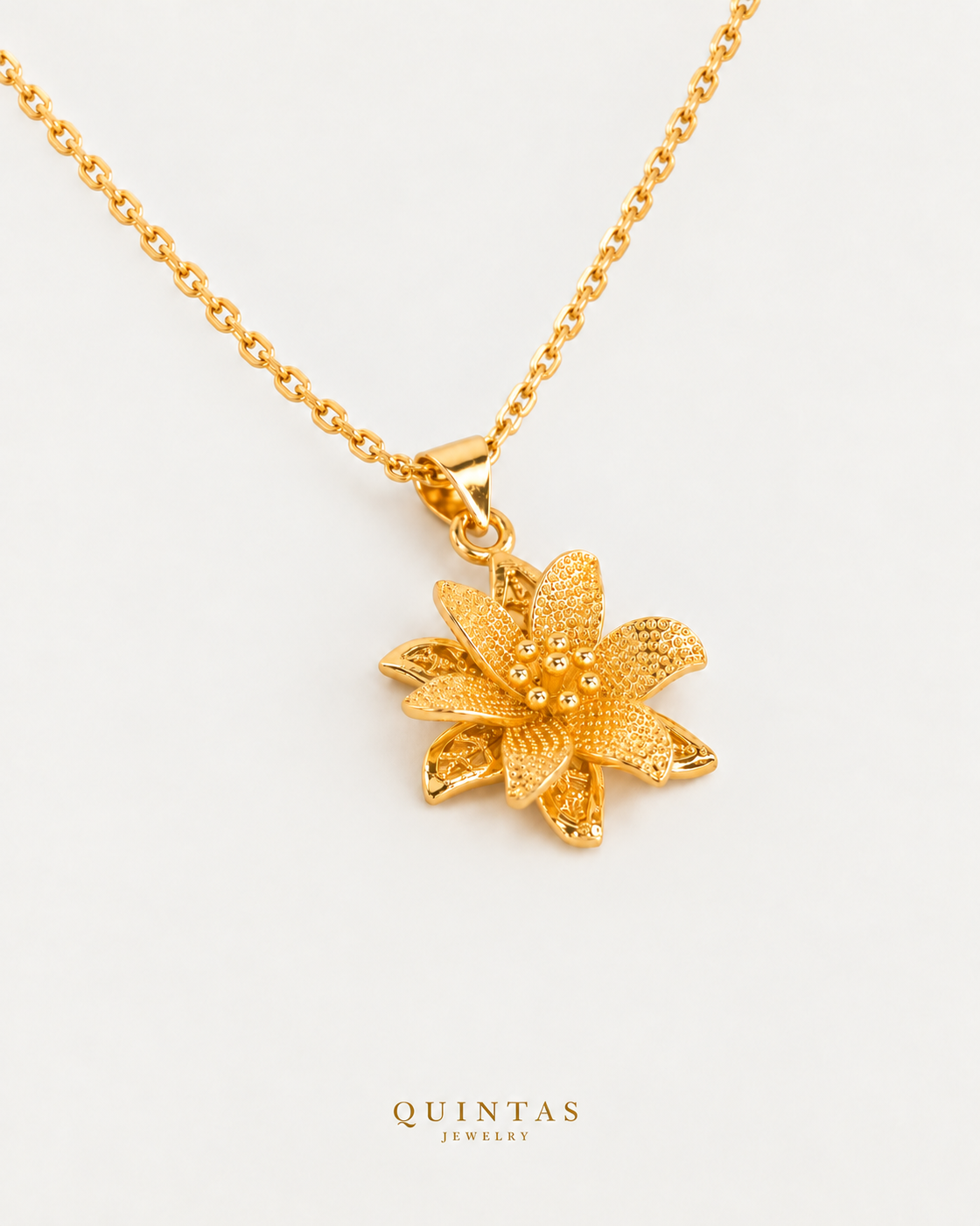 The Flower Necklace, cable chain, oblique companion, neutral greige and canonical gold logo