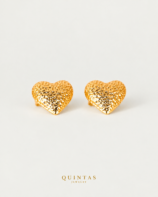 Vivere Heart Stud Earrings, yellow gold stud earrings, neutral greige background