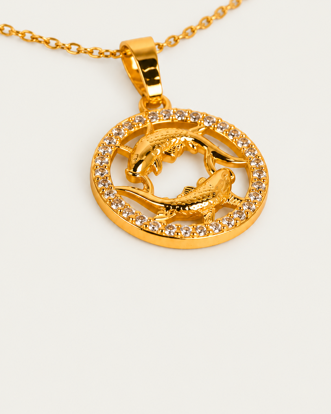 QUINTAS Zodiac Sign 18k Necklace — Pisces / actual cable-chain oblique view, neutral greige