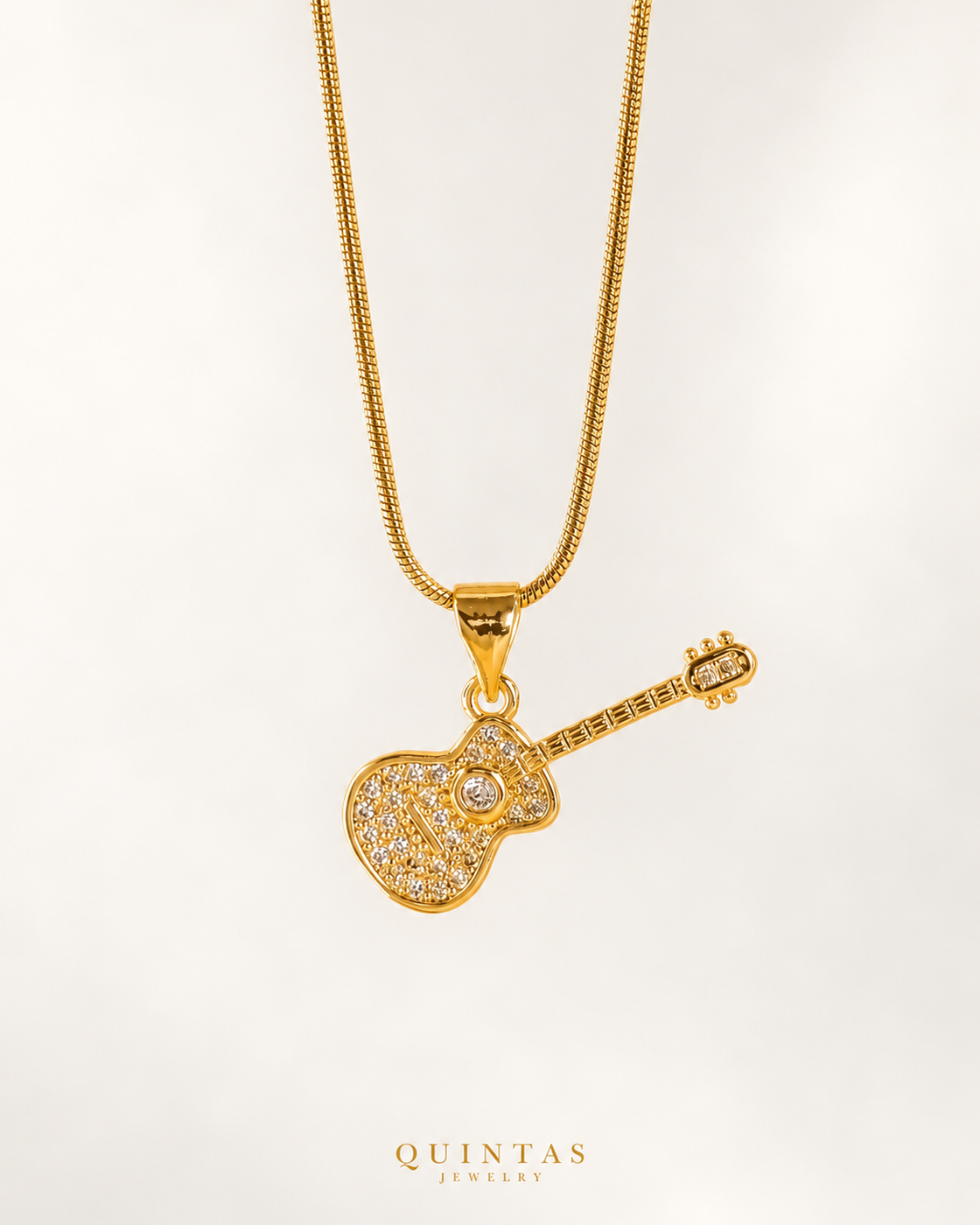 The Guitar Necklace — actual Snake chain, source-faithful off-white second photo