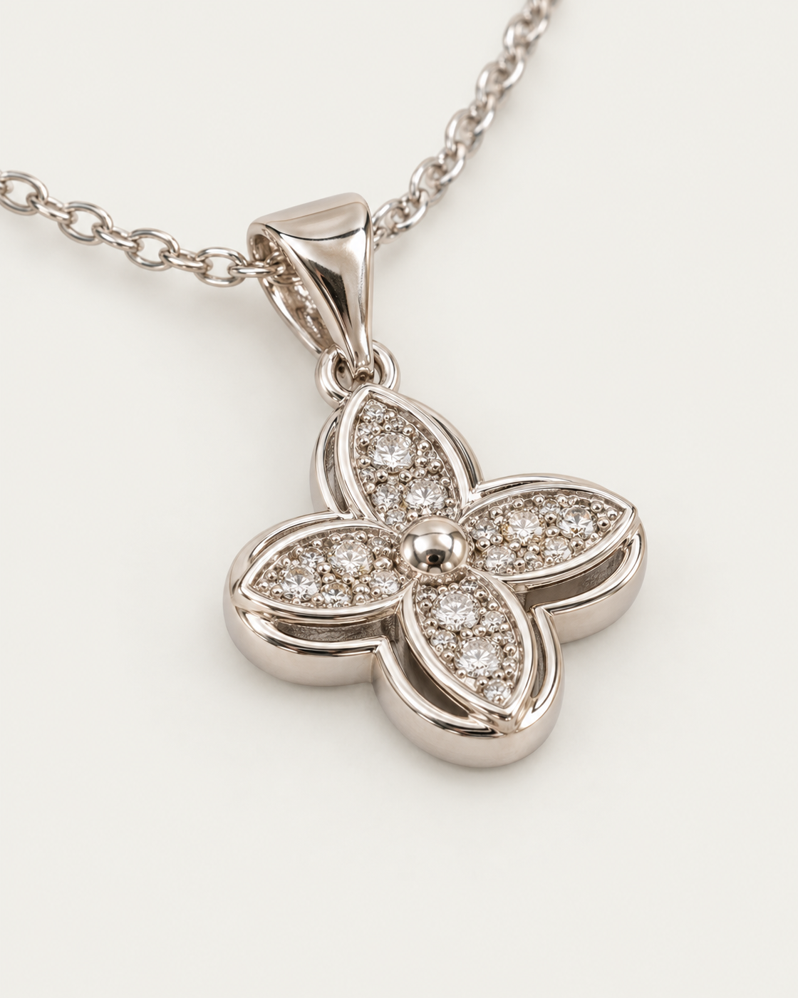 Silver Fortune Clover Necklace — cable chain, genuine oblique detail, neutral greige background