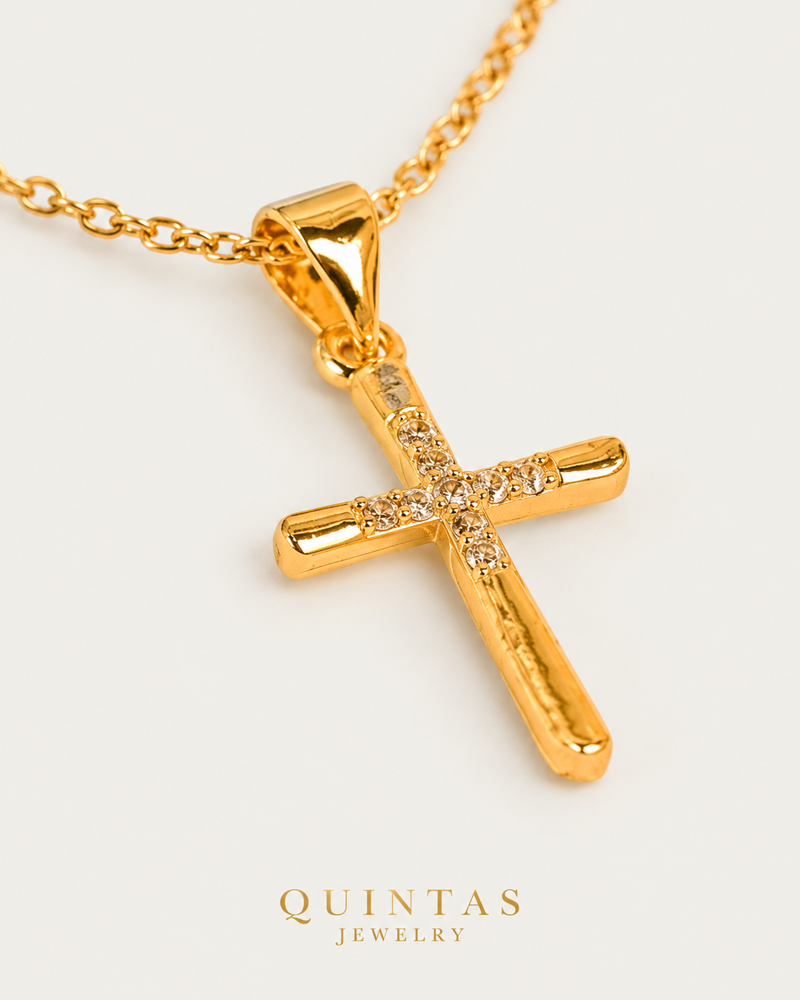 Studded Cross — cable chain, genuine oblique detail, neutral greige background
