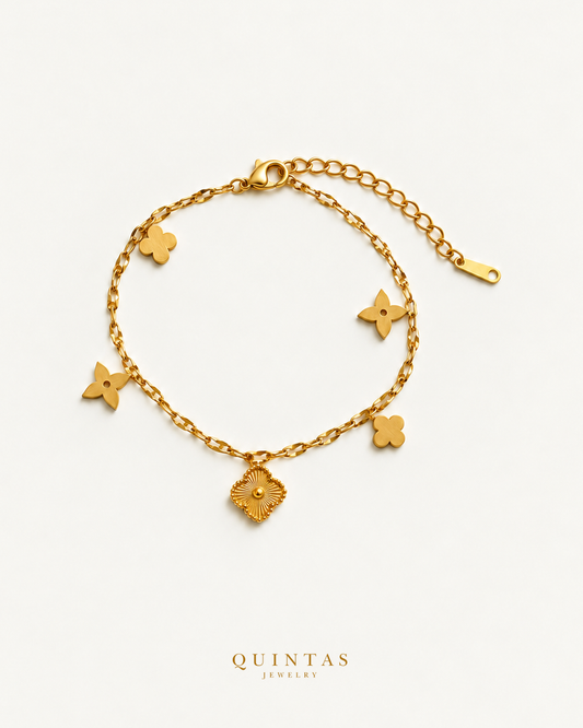Clover de Fortune Bracelet, overhead flat arrangement on off-white
