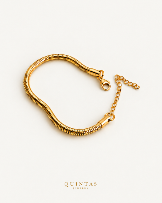 Round Snake Chain Bracelet, oblique view of same source-faithful open arrangement on off-white