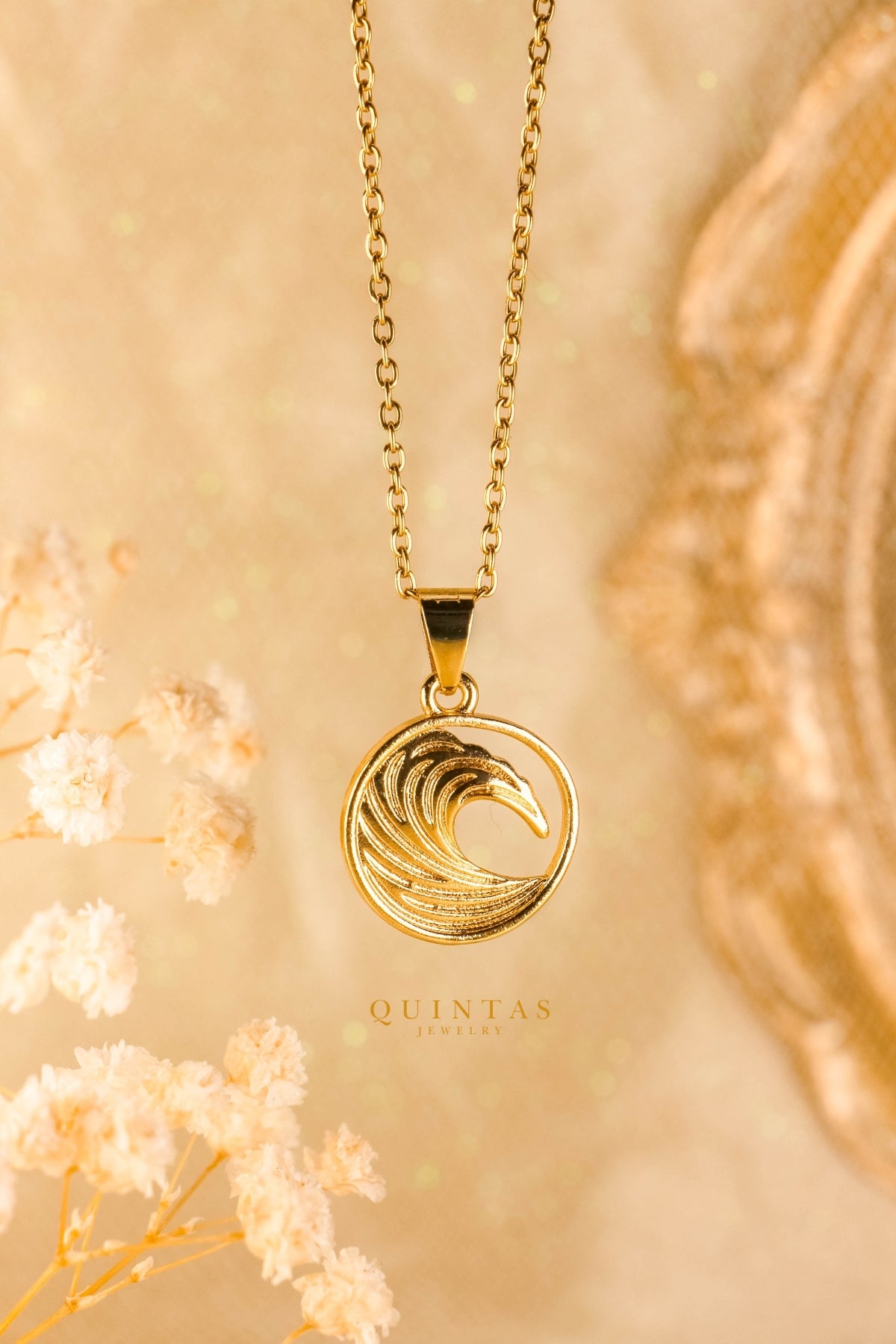Gold wave necklace on sale